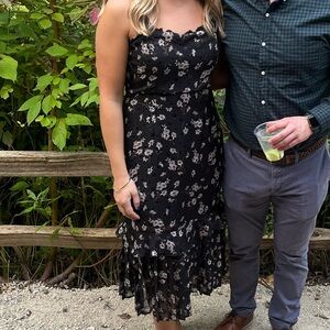 Floral Black Dress with Ruffle Hem